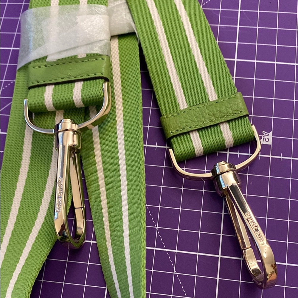 Reduced NWOT Kate Spade Rosie Green and White Strap with Gold Hardware.